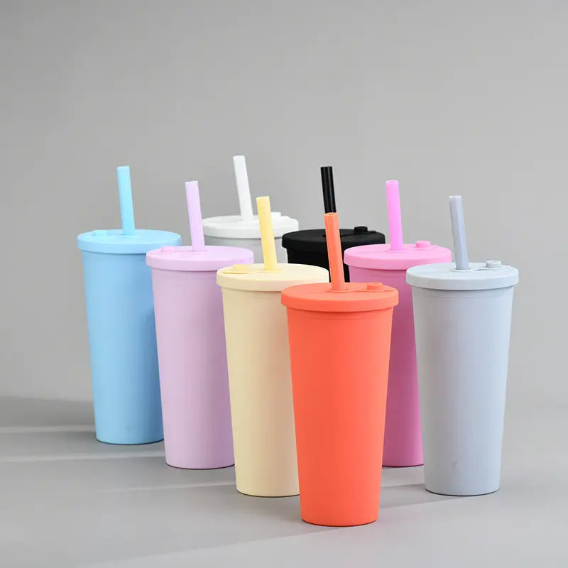 A collection of colorful double layer insulated boba cups with straws, available in blue, pink, yellow, black, and orange colors.