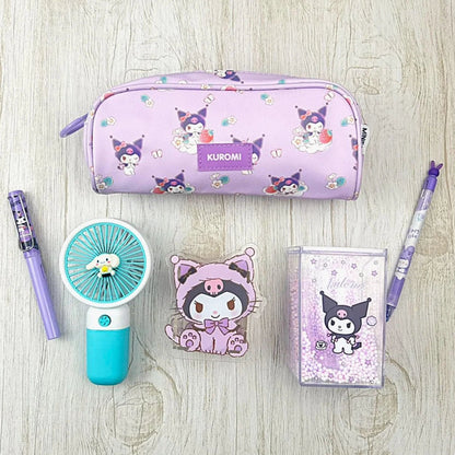 Kuromi-themed stationery items including a pencil case, fan, and notebook on a wooden surface.
