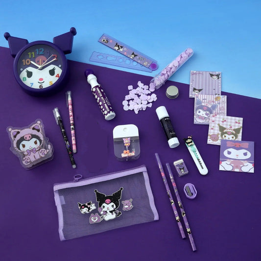 Collection of stationery items with cat-themed designs on a purple surface.