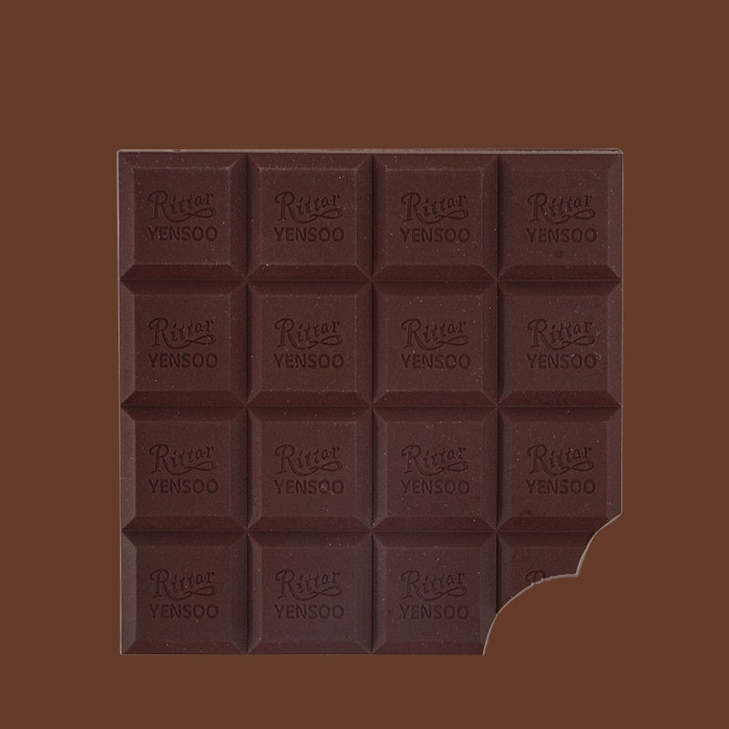 Dark chocolate bar with Ritter Sport logo on a brown background
