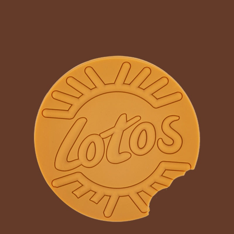 Round cookie with 'Lotos' branding on a brown background