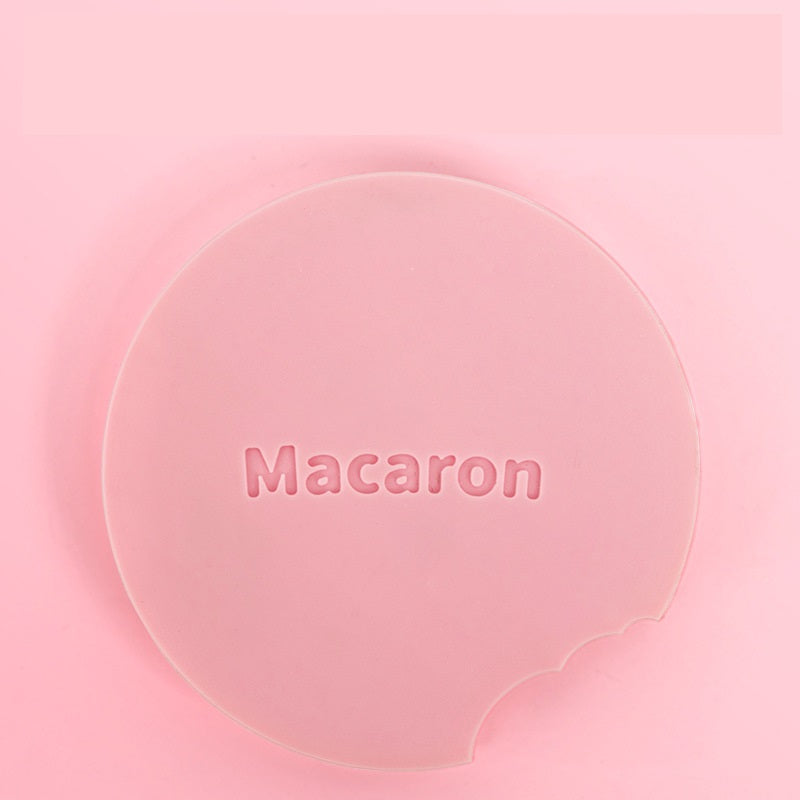 Pink silicone lid with 'Macaron' text on a pink background