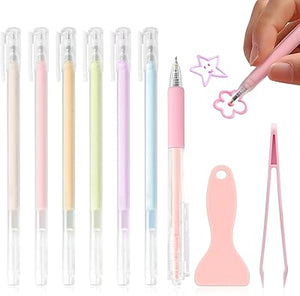 Set of pastel-colored pens with a hand holding one, star, and flower designs nearby.