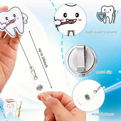Tooth-themed badge reel with metal clip and snap fastener, held by a hand against a blue background.