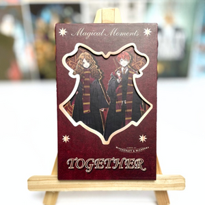 Card with characters and 'Together' text on a wooden stand
