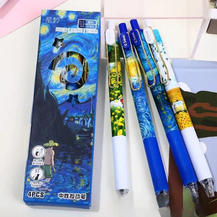 Set of pens with Van Gogh-themed packaging on a white surface