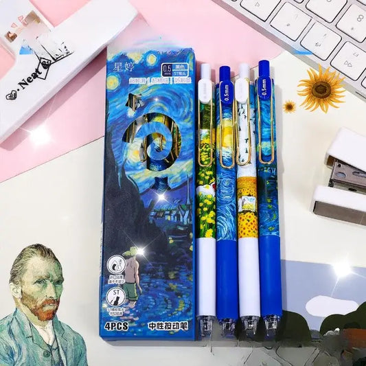 Set of pens with Van Gogh 'Starry Night' design packaging on a desk with office supplies.