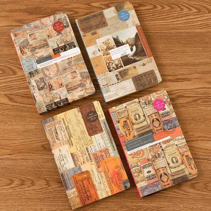 Four decorative notebooks with vintage-style covers on a wooden surface