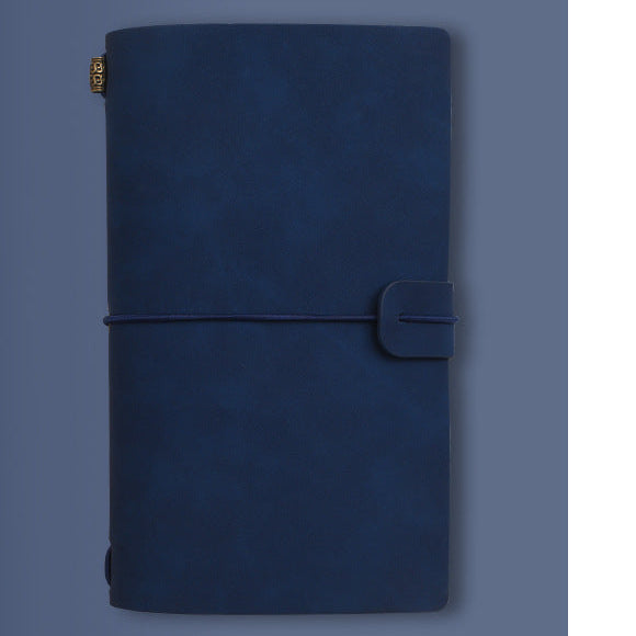 Blue notebook with text and dimensions on a blue background