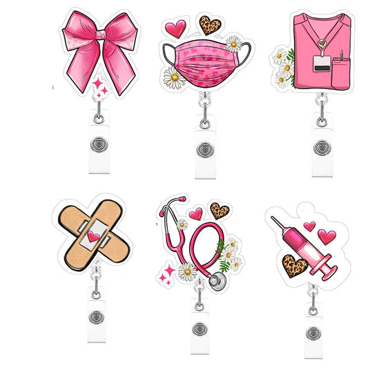 Set of six badge holders with various designs on a white background