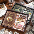 Decorative stationery set with butterfly-themed items on a wooden surface