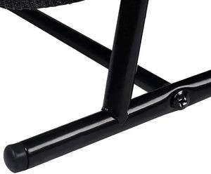 Close-up of a black metal chair frame on a white background
