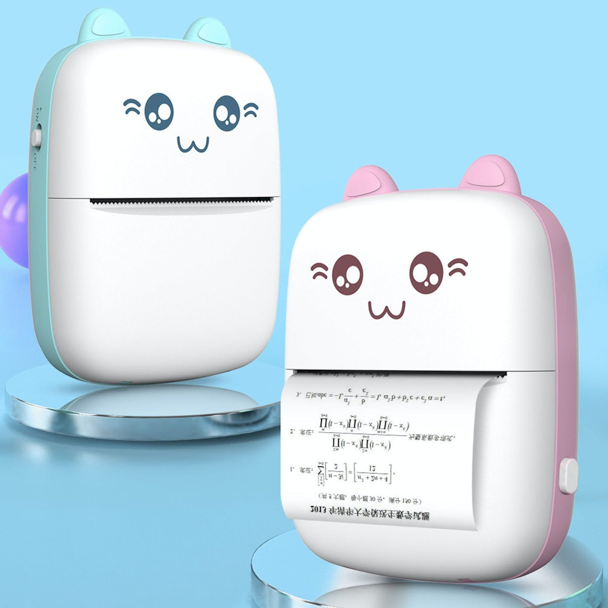 Two portable thermal mini printers, one in blue and one in pink, with cute animal face designs on the front, displaying a printed picture.