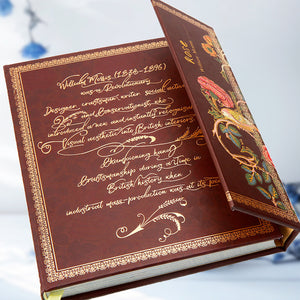 Decorative book with ornate cover and text on a light background