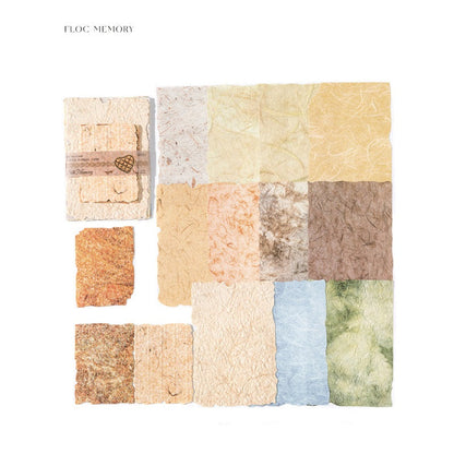 Collection of textured paper squares in various colors on a white background