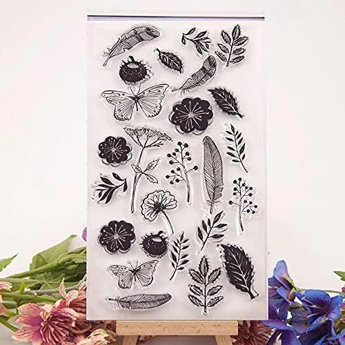Clear stamp set with black floral and butterfly designs on a white background.