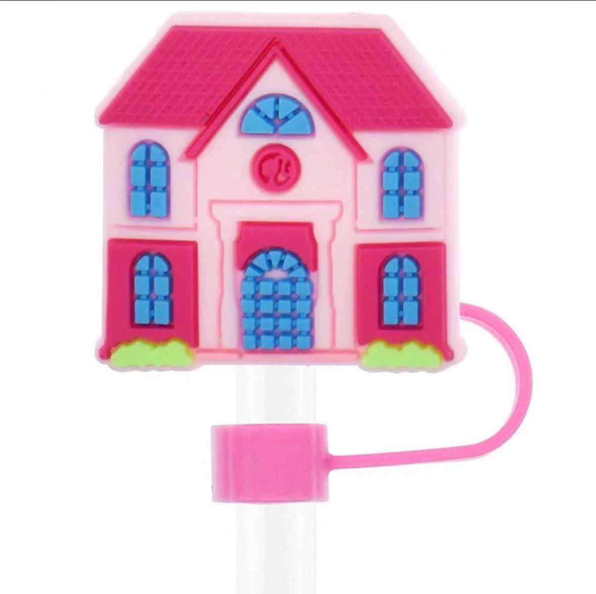 Pink toy house with blue windows on a white background