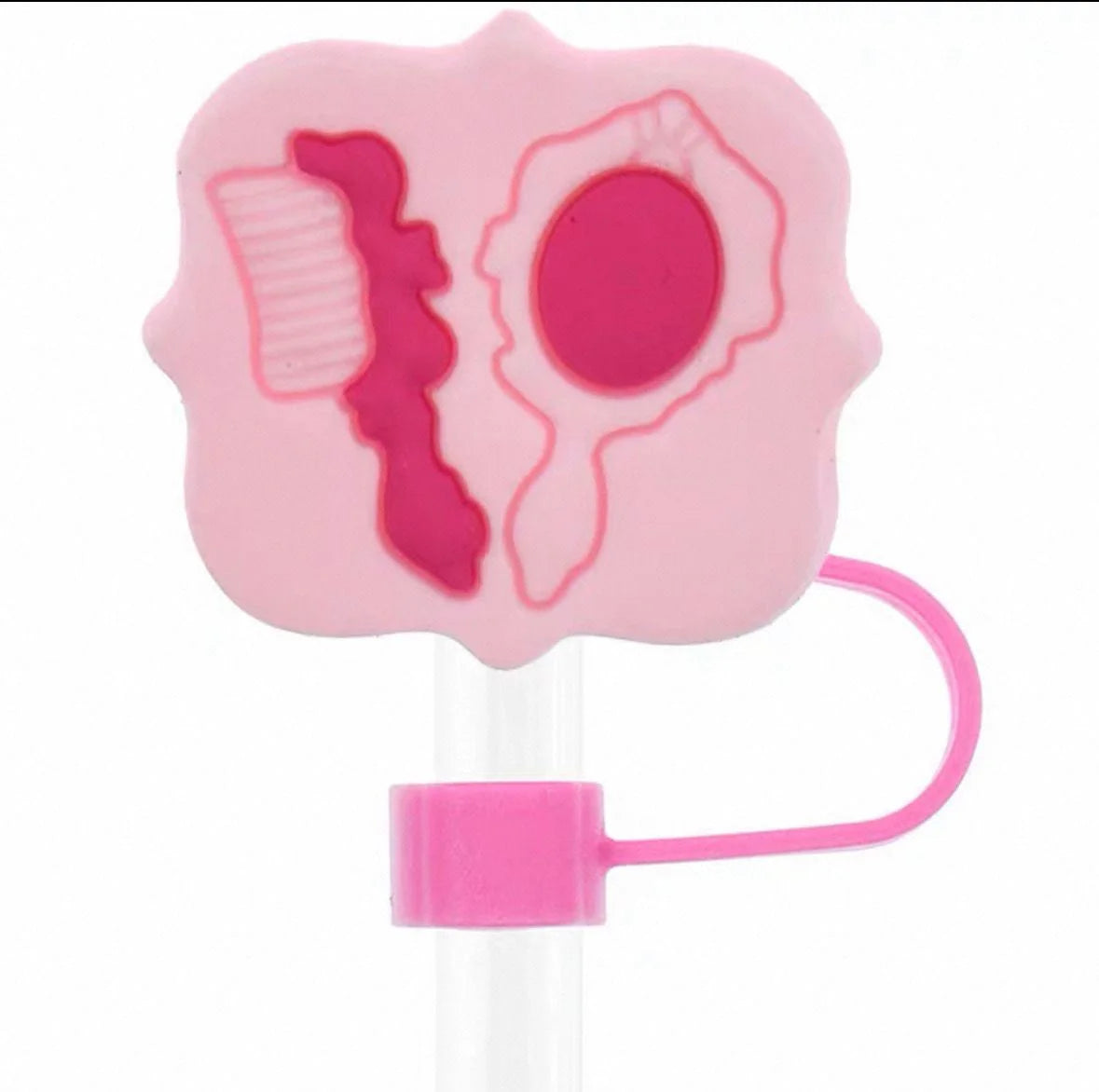 Pink and white hair tie with a detailed design on a white background