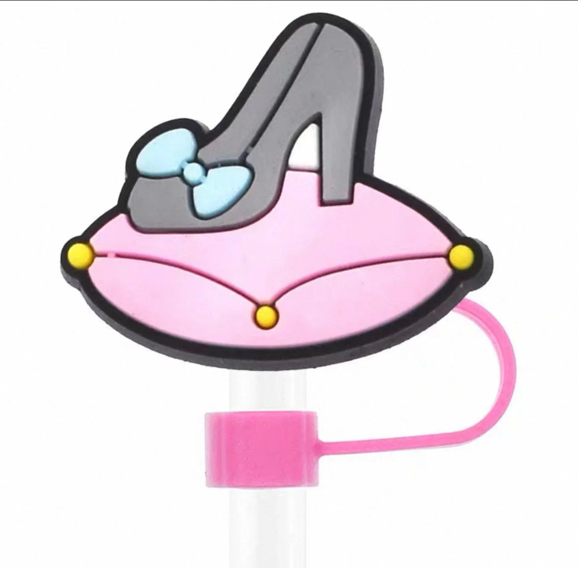 Pink high-heeled shoe with a bow on a white background