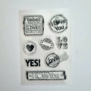 Clear stamp set with various love-themed designs on a white background
