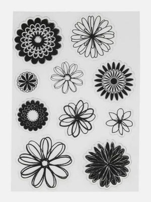 Sheet of black floral designs on a white background