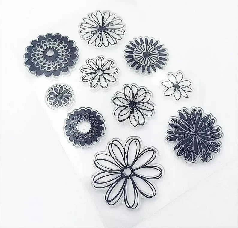 Set of black and white floral designs on a white background