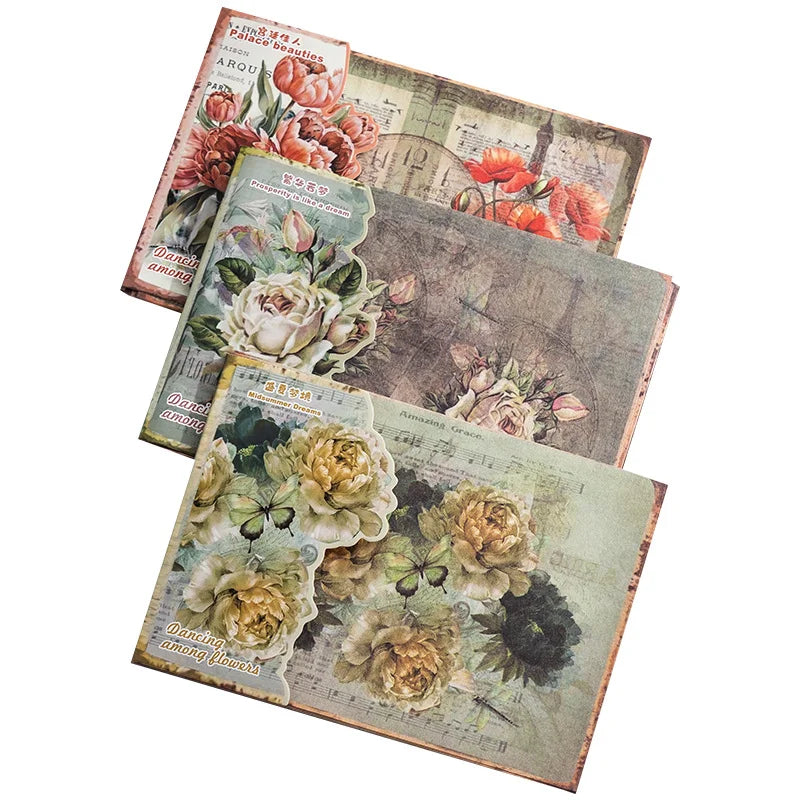 Set of four floral-themed notebooks on a white background
