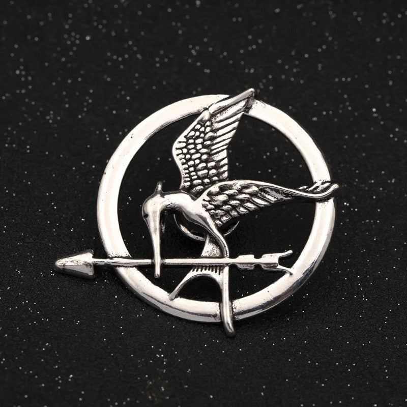 Mockingjay brooch deals